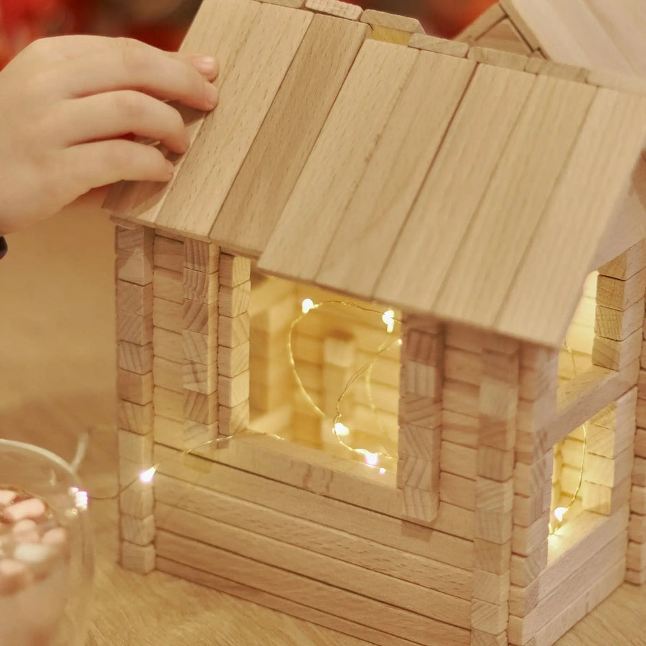 Constructor wooden house with a balcony